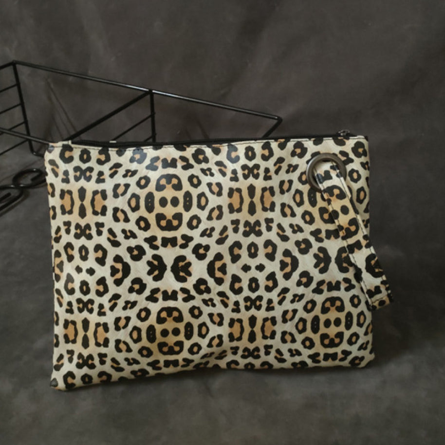 leather leopard clutch